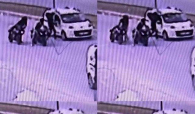 Kaskla tartıştığı sürücünün aracına zarar verdi: O anlar kamerada