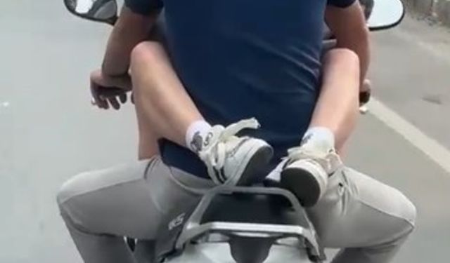 Motosiklette kucağında yolcu taşıyan sürünce 32 bin TL ceza